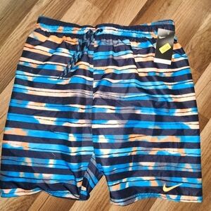 NIKE Men's Orange And Blue Swim Trunks Size XL, gently used no signs of wear